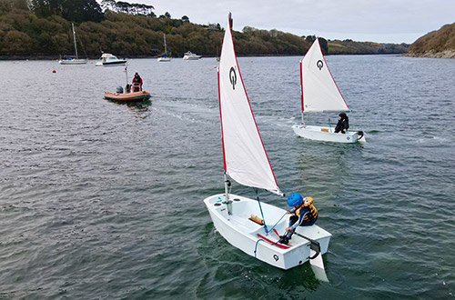 Youth Club Racing Dinghies on the river with CST Experiences