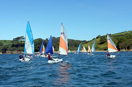 Colourful sailing boats on the adult sailing courses with CST Experiences