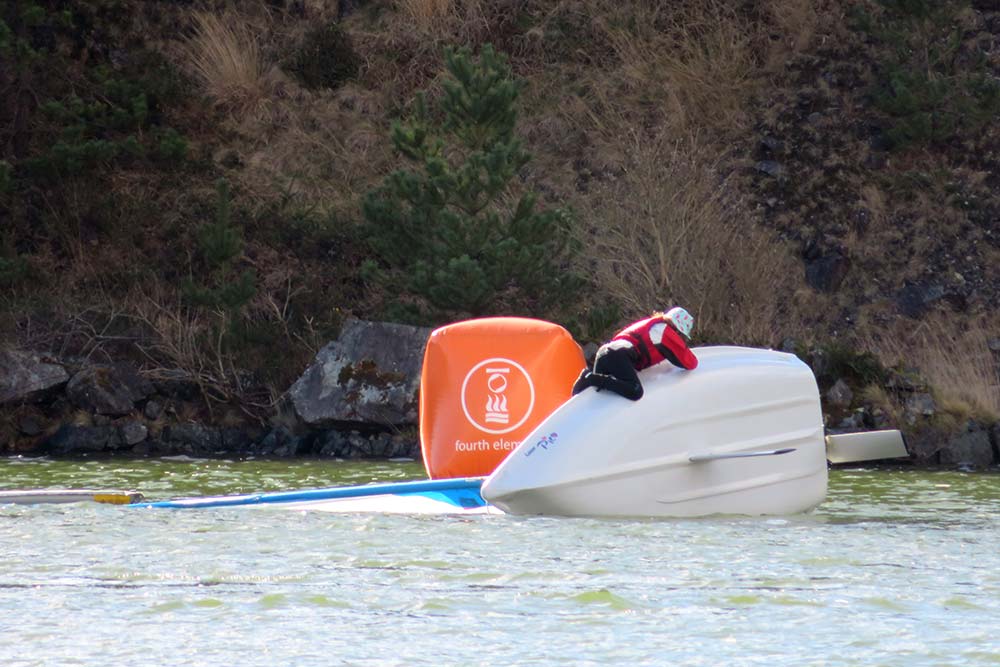 Pico Dinghy capsized safely by a sailor at Trevassack Lake with CST Experiences