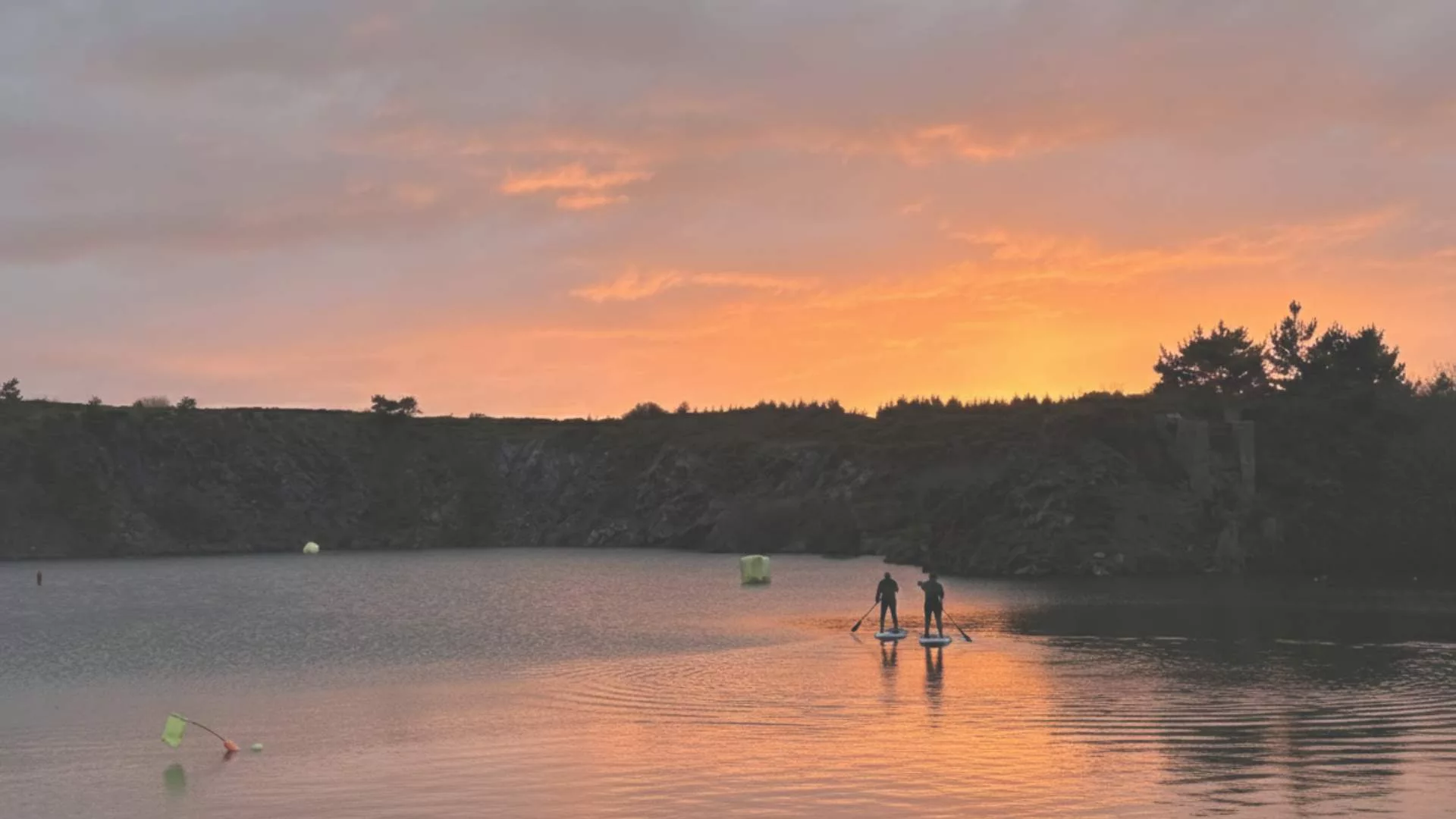 Paddleboarding on Trevassack Lake in the evening